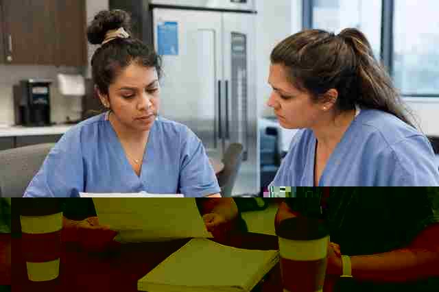 Surgical technologist in scrubs reviewing a job offer at a hospital desk